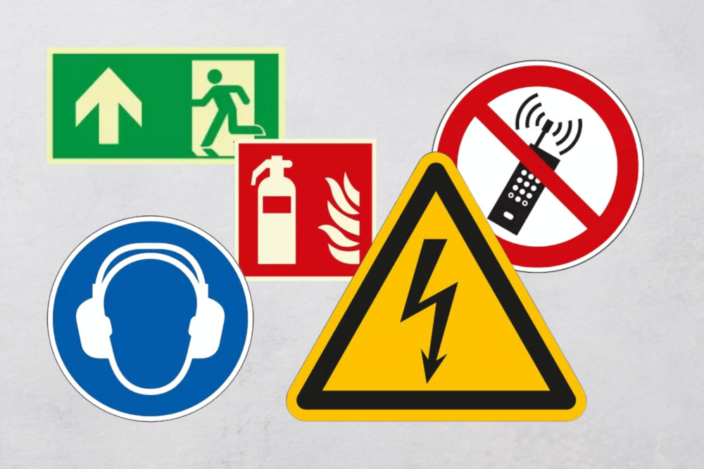 verschiedene_Arten_von_Sicherheitsschildern_Rettung_Verbot_Gebot_Blitzpfeil_Feuerlöscher